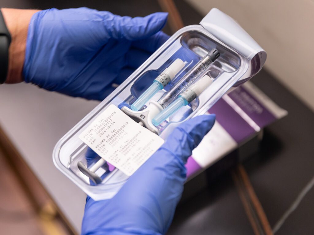 A Xanadu provider is preparing the materials for lip filler in Fort Collins.